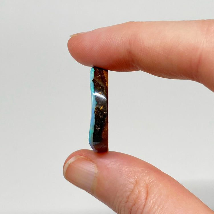 29.47 Ct free-form ocean tone boulder opal