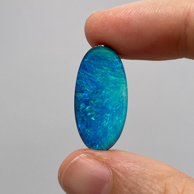 10.08 Ct green-blue oval boulder opal