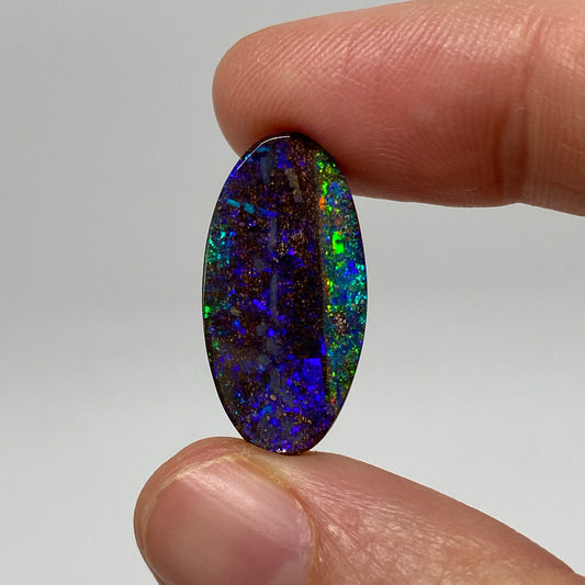 9.54 Ct purple oval boulder opal